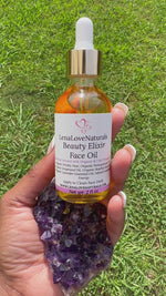 Load and play video in Gallery viewer, Beauty Elixir Face Oil Infused Amethyst Crystals
